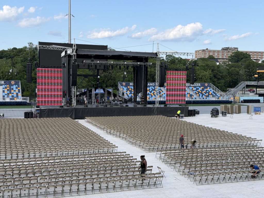 Wide stadium production setup for Bill Burr at Centreville Bank Stadium.