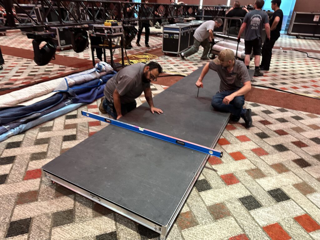 Custom stage fabrication for a confidential senior leadership event at Mohegan Sun.