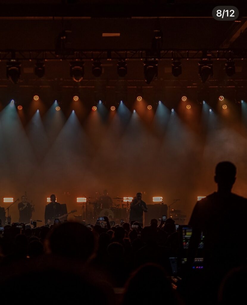 Audience view of concert stage lighting at MassMutual Center.