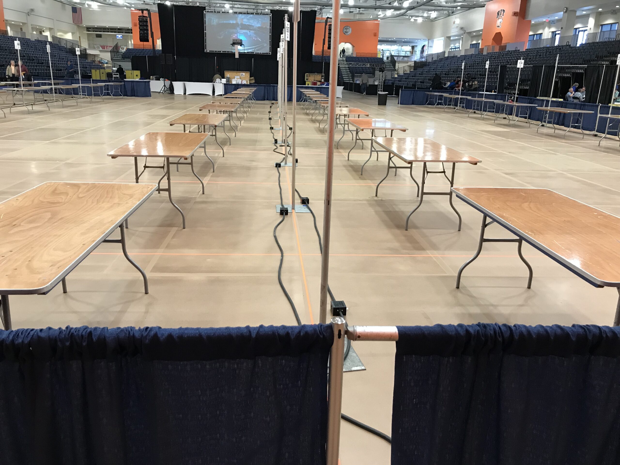 FIRST Robotics Competition team pit area at the 2018 Finger Lakes Regional at Rochester Institute of Technology during event setup.