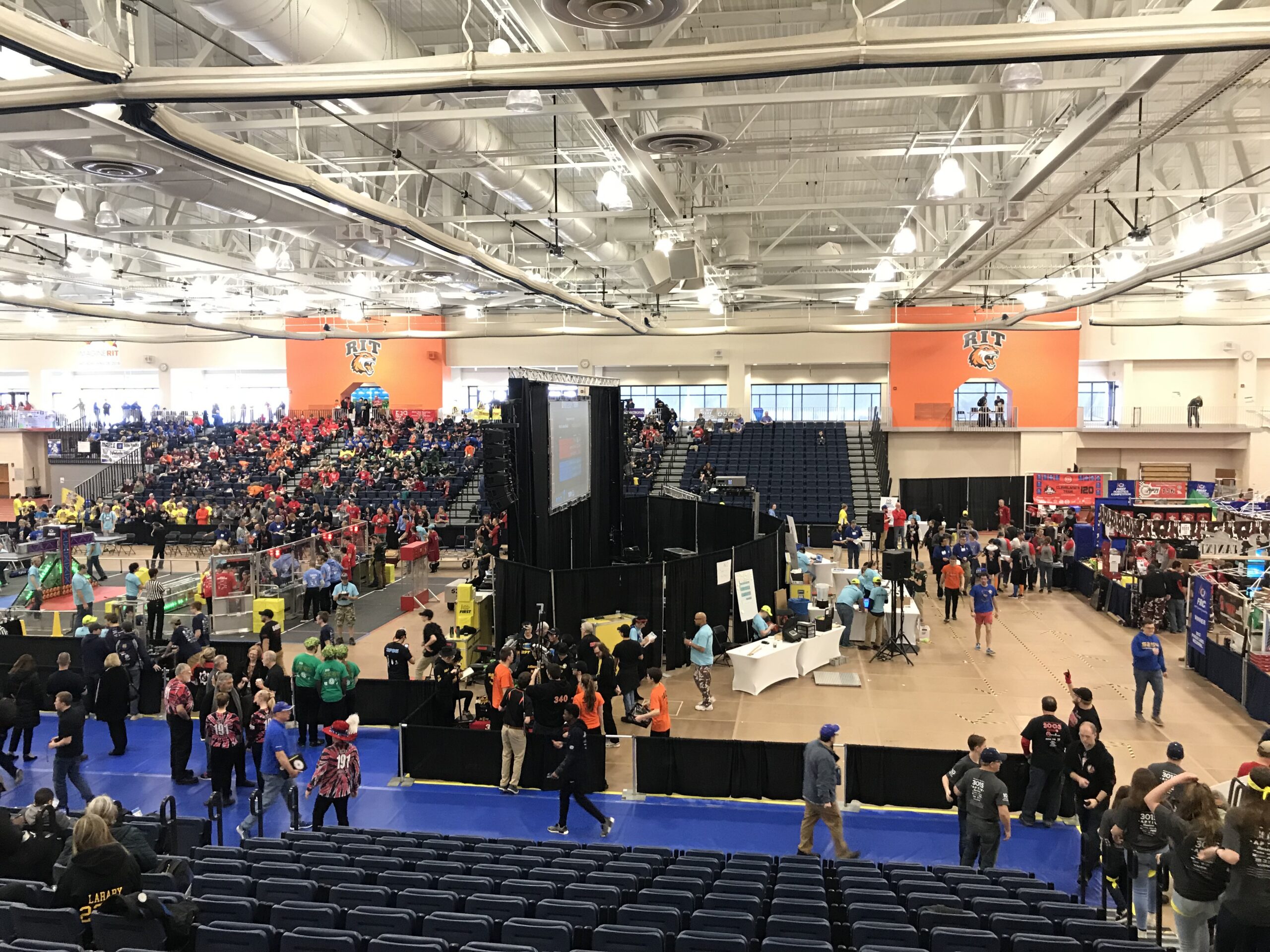 FIRST Robotics Competition team pits and competition floor during the 2018 Finger Lakes Regional at RIT.