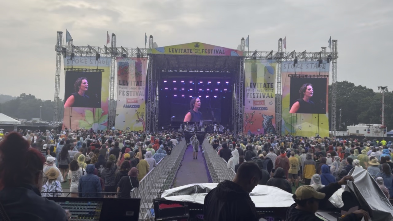 Levitate Music Festival July 2026 audience view with live IMAG on the two LED side walls and upstage LED content.
