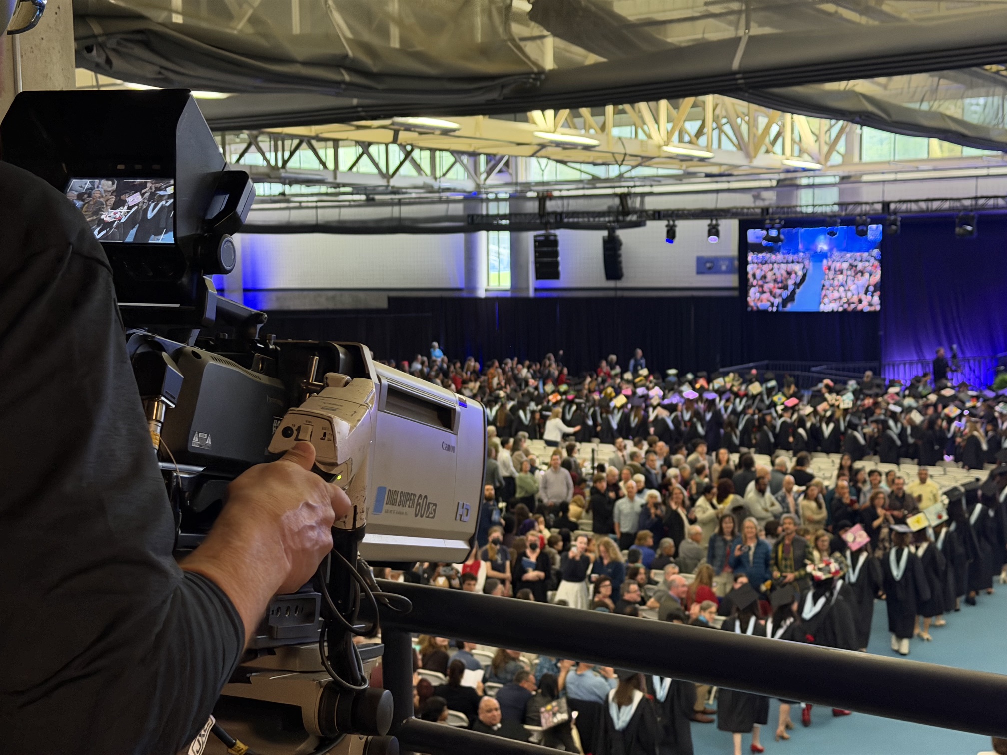Springfield College commencement production with stage video and center-hung display